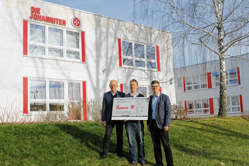 Geschäftsführer Jens Reimann und Dieter Lange (re. und li.) sowie Roland Hauke (mi.). Foto: Johanniter
