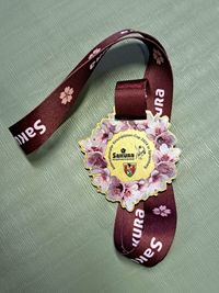 Die Medaille...